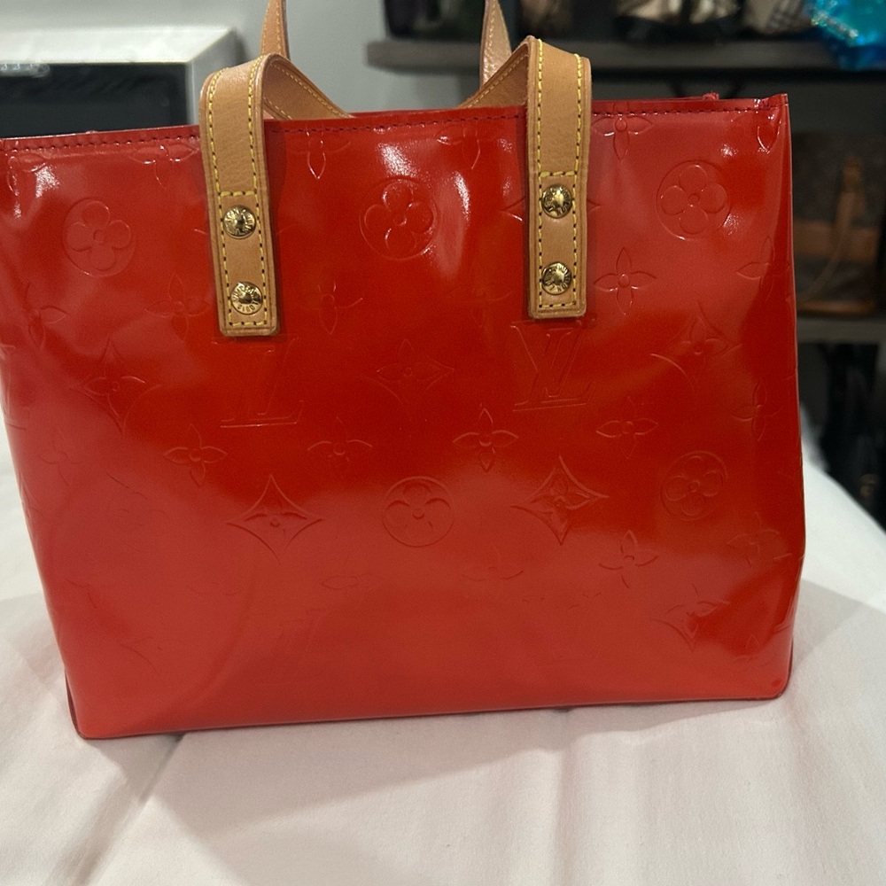 Louis Vuitton Red Glossy Tote Bag with Structured Design